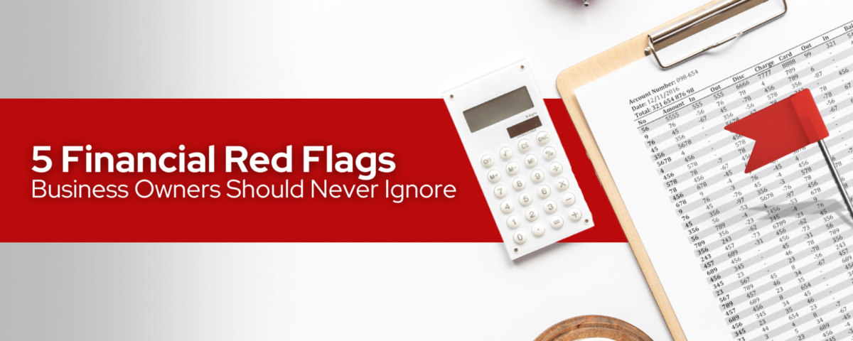Desk with calculator, coffee, clock, financial red flags and financial records