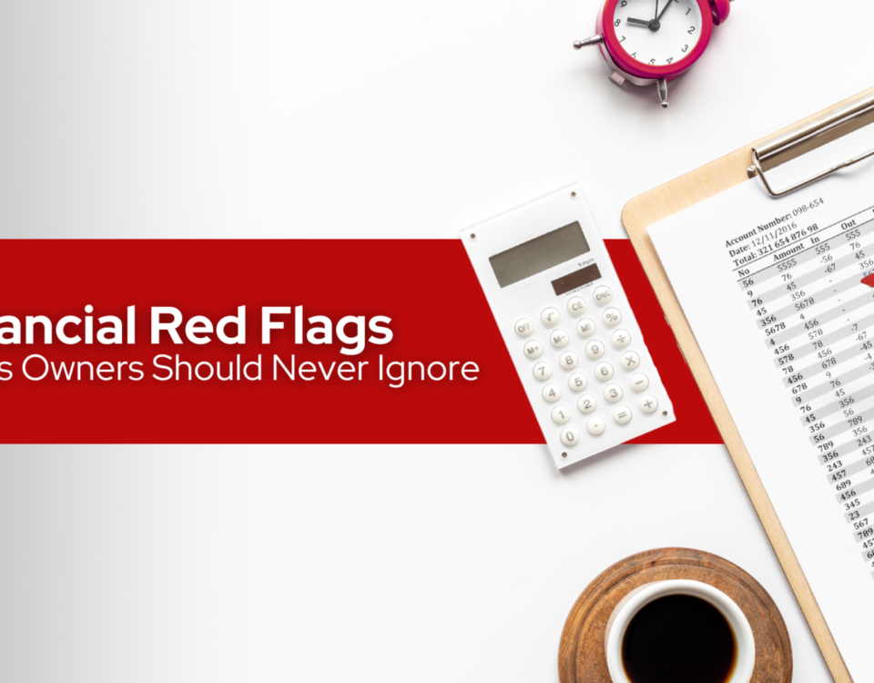 Desk with calculator, coffee, clock, financial red flags and financial records